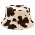 Bob taille unique en tissu bouclé écru et marron motif vache style décontracté